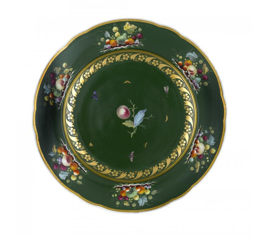 A DERBY GREEN GROUND PLATE FROM