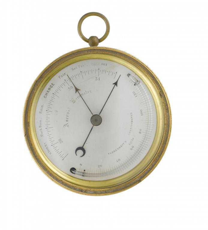 AN ENGLISH BRASS ANEROID BAROMETER
the