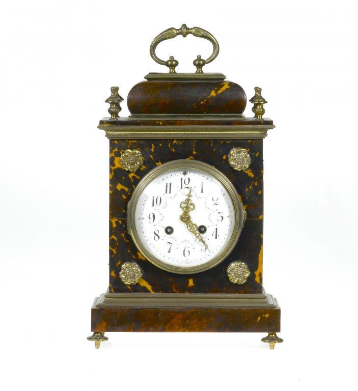 AN EDWARD VII TORTOISESHELL CLOCK
the