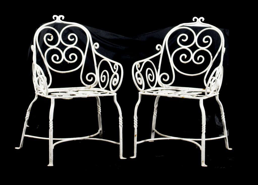 A PAIR OF WROUGHT IRON GARDEN CHAIRS of 109517