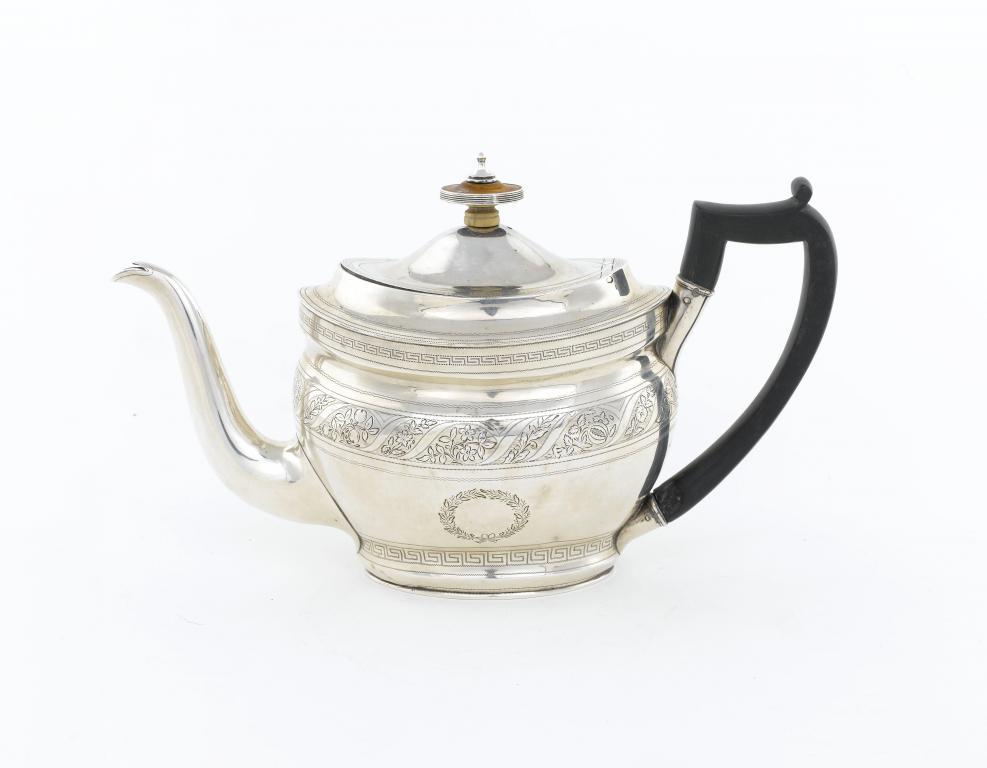 A GEORGE III BRIGHT CUT OVAL TEAPOT
the