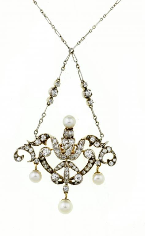 A DIAMOND AND CULTURED PEARL PENDANT of 109547