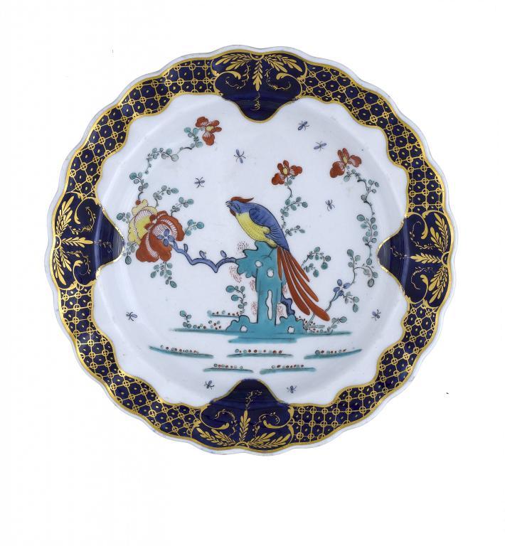 A DERBY PLATE
enamelled with the Sir