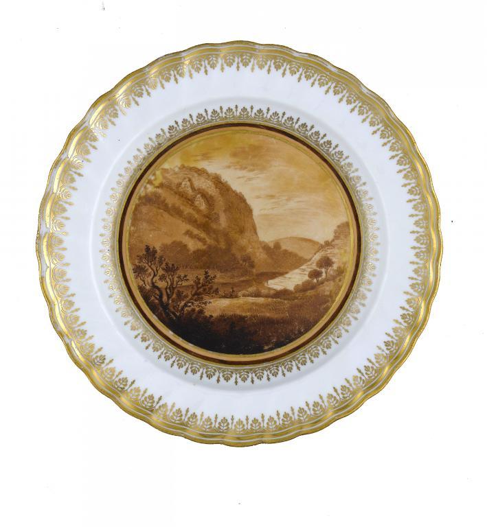 A DERBY PLATE
painted in warm