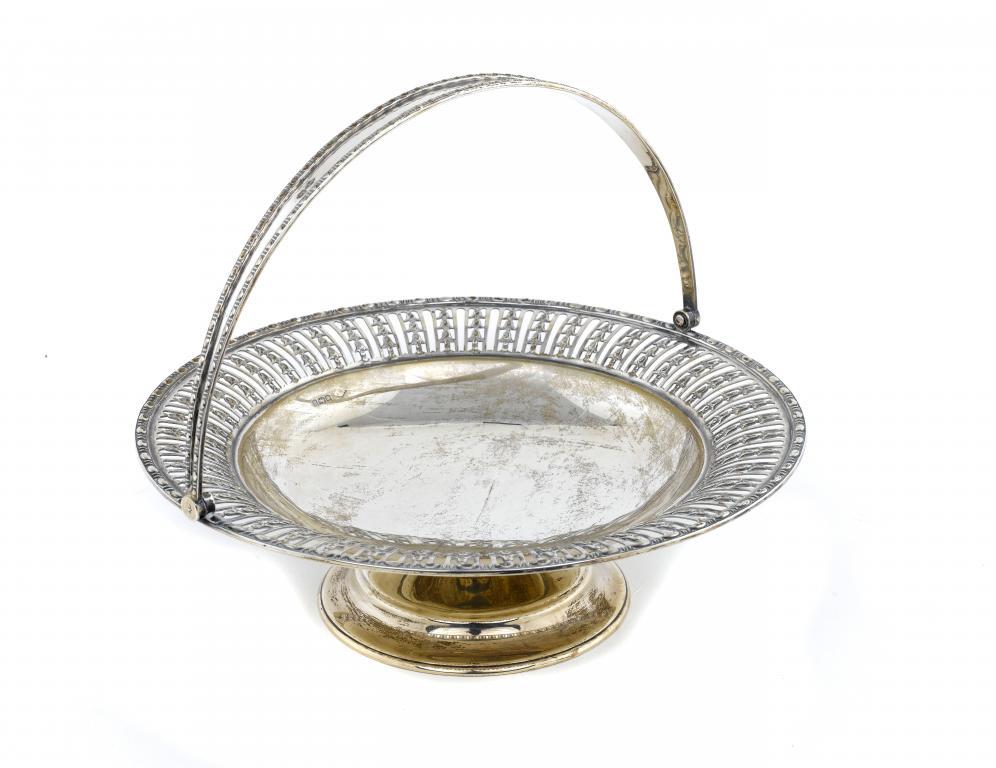 A GEORGE V CAKE BASKET
with swing