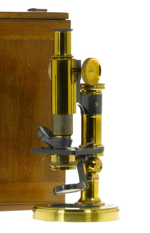 AN ENGLISH BRASS COMPOUND MICROSCOPE 1095c2