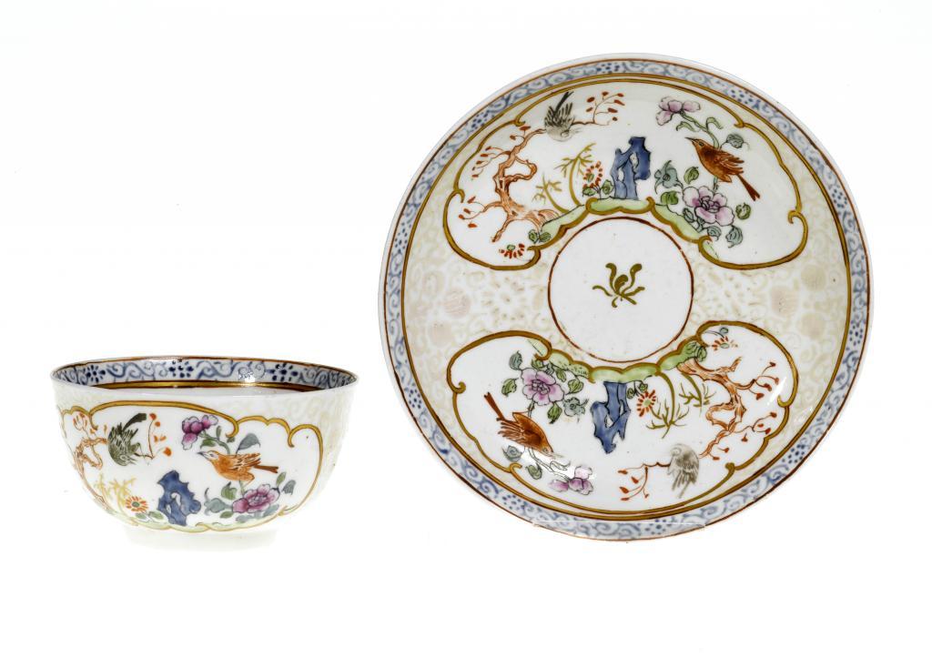 A DERBY TEA BOWL AND SAUCER painted 109628