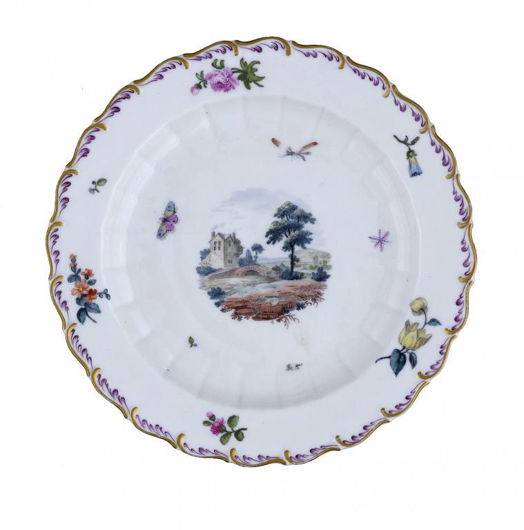 A DERBY PLATE
painted in polychrome