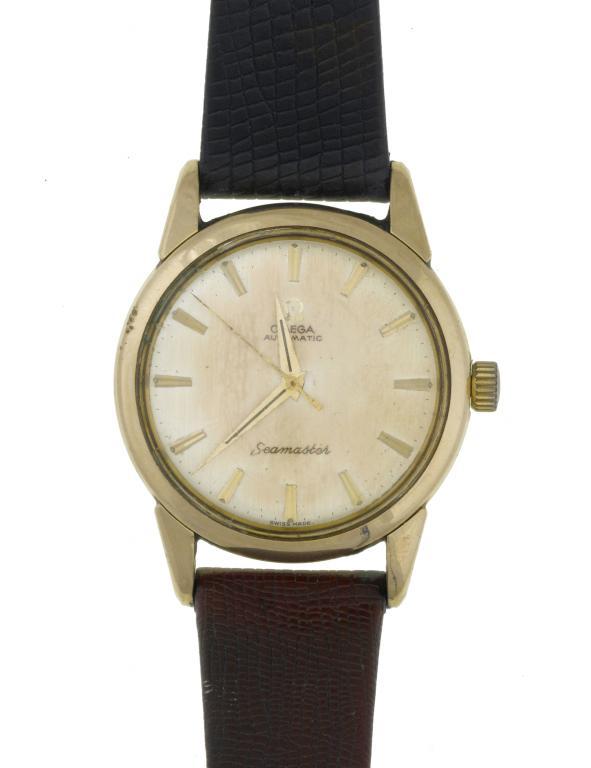 AN OMEGA 9CT GOLD WRISTWATCH 
SEAMASTER