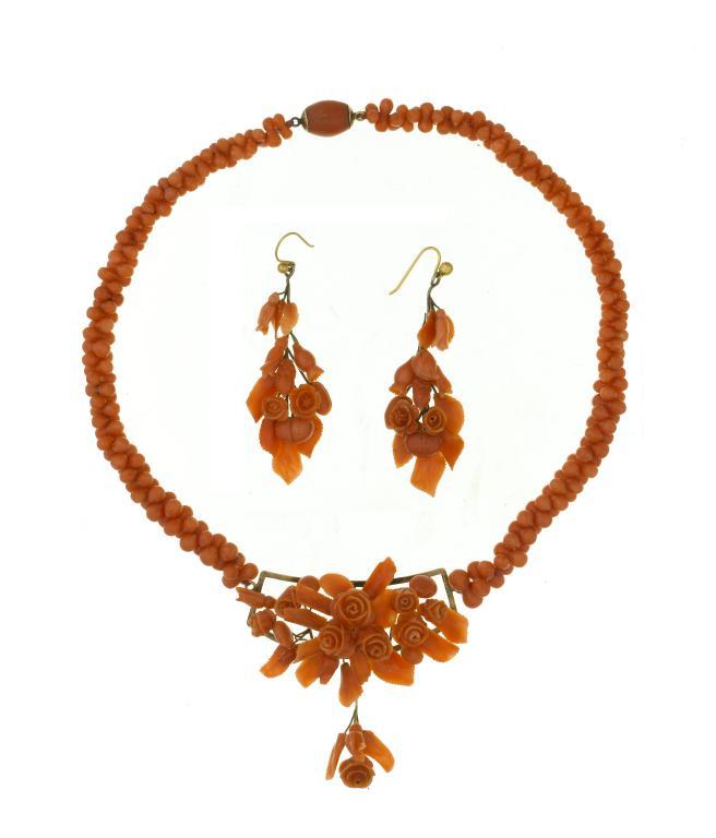 AN ANTIQUE CORAL DEMI-PARURE
of necklace