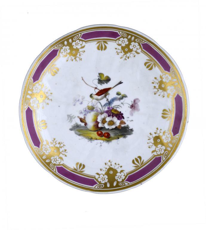 A STAFFORDSHIRE PORCELAIN SAUCER-DISH
painted