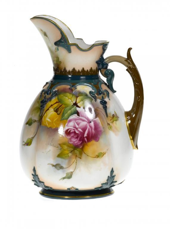A ROYAL WORCESTER EWER of lobed 1096e0