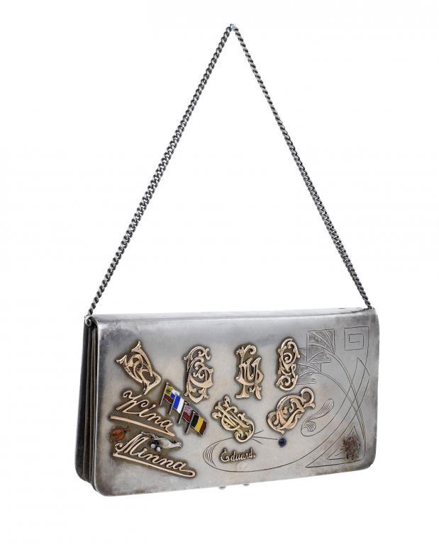 A RUSSIAN SILVER AND ENAMEL PURSE with 109703