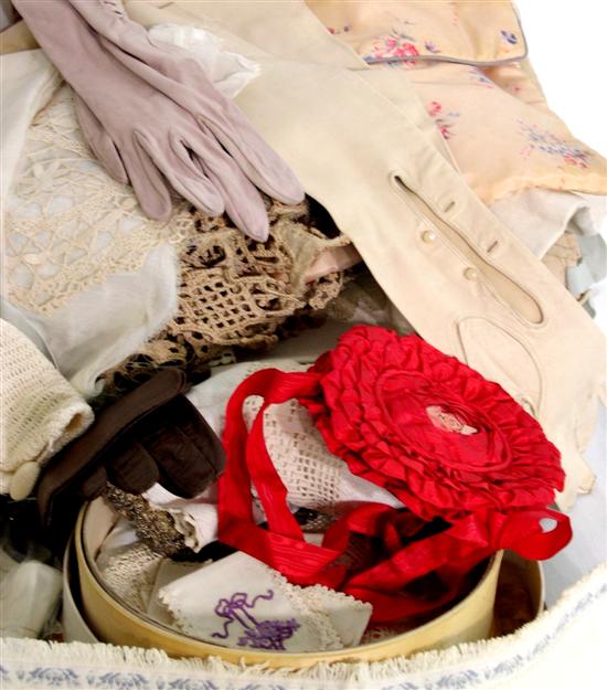 Assortment of vintage textiles including: