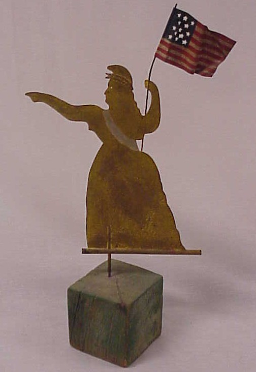 Painted sheet metal figure of a