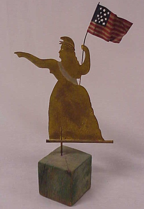 Painted sheet metal figure of a woman