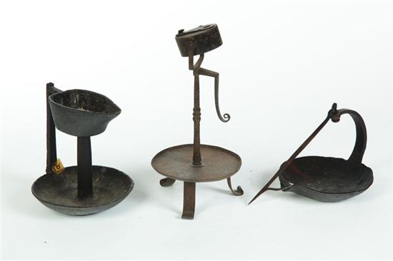 THREE WROUGHT-IRON LAMPS.  American
