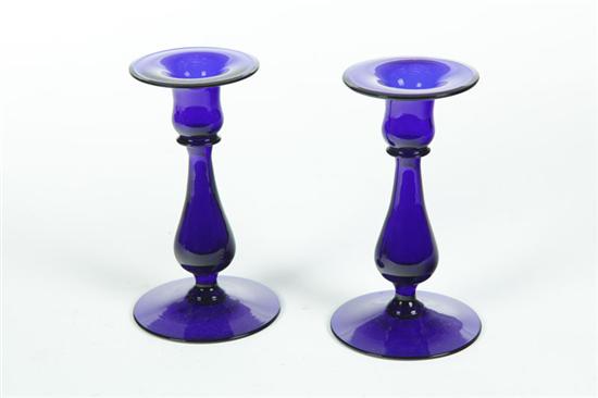 PAIR OF GLASS CANDLESTICKS.  Probably