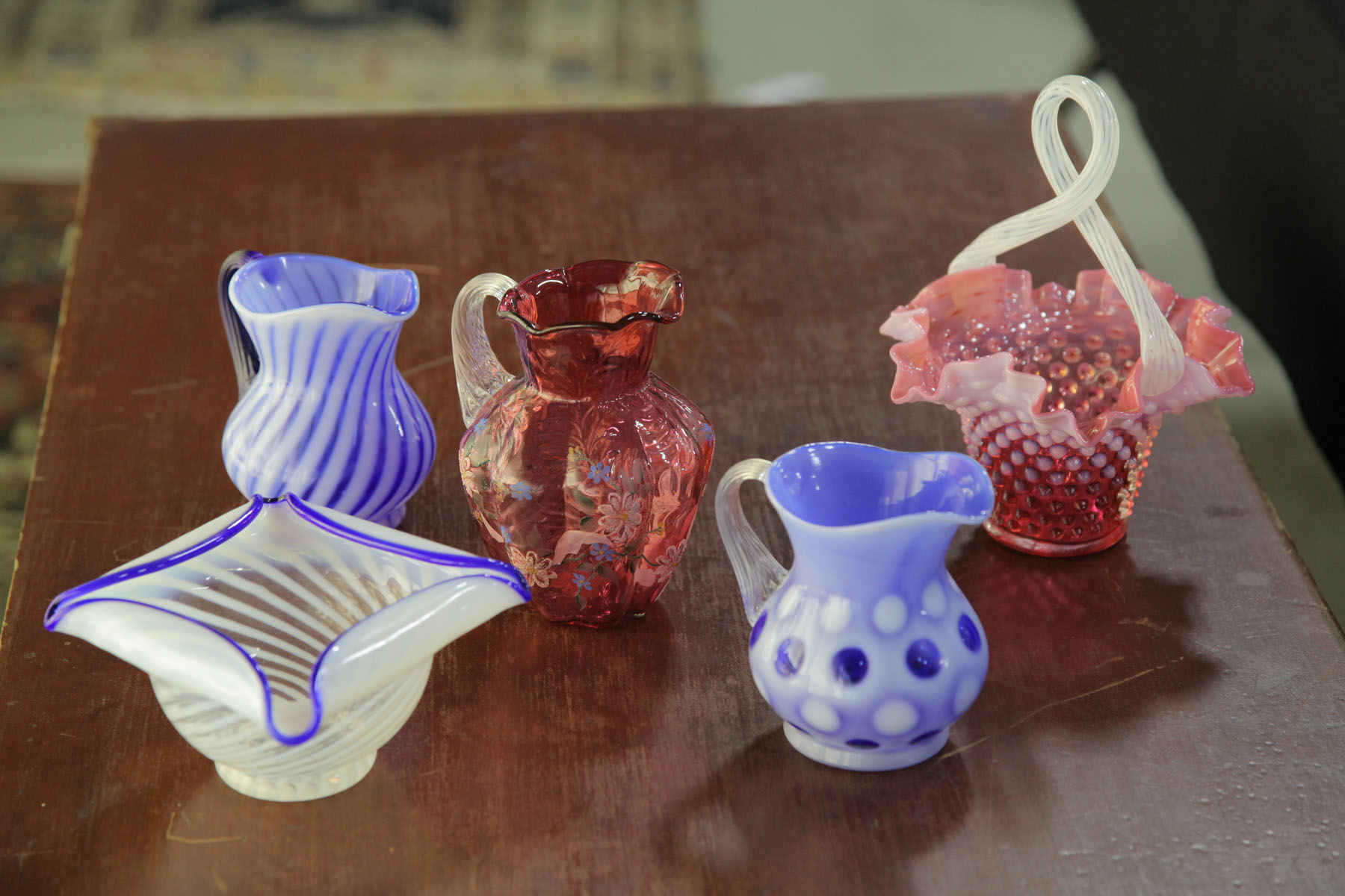 FIVE PIECES OF FENTON ART GLASS.  West