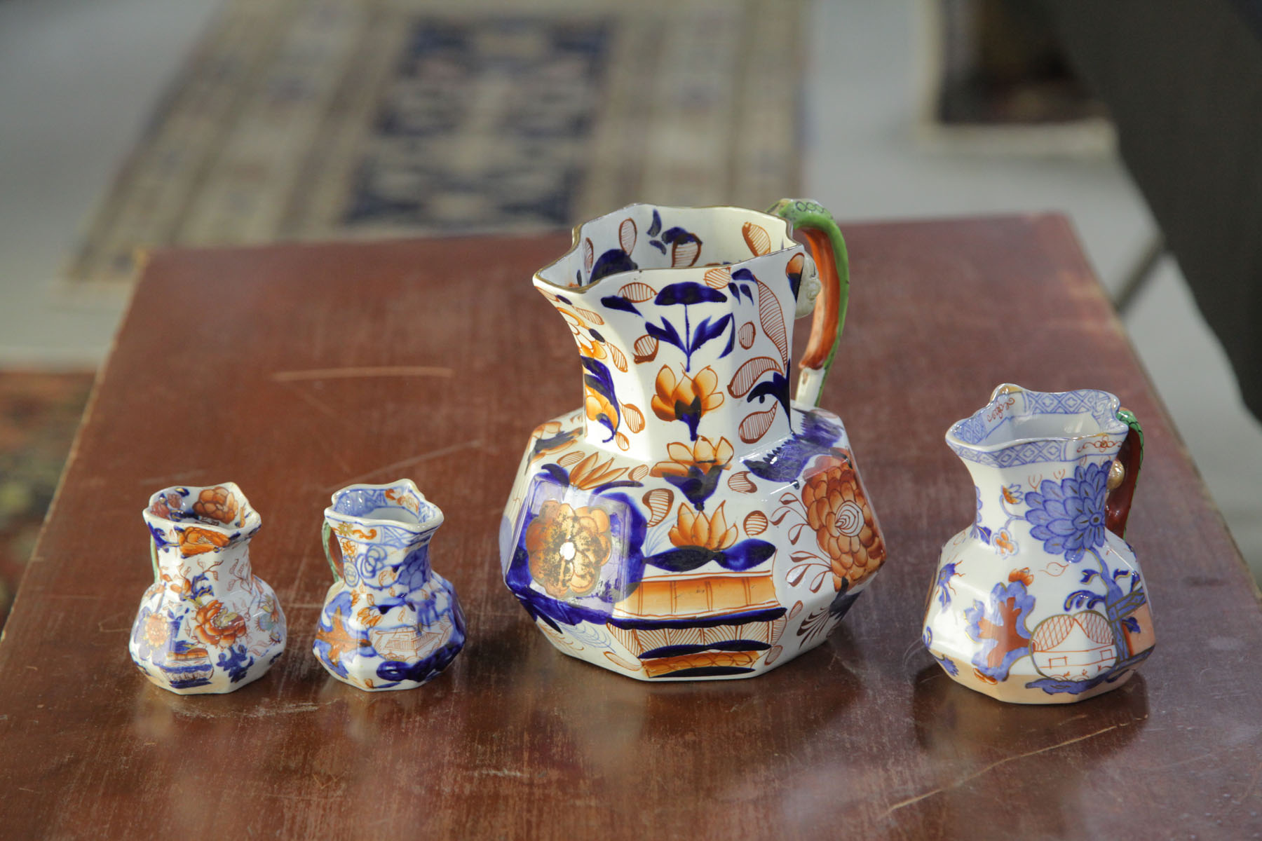 FOUR MASONS IRONSTONE PITCHERS.  England