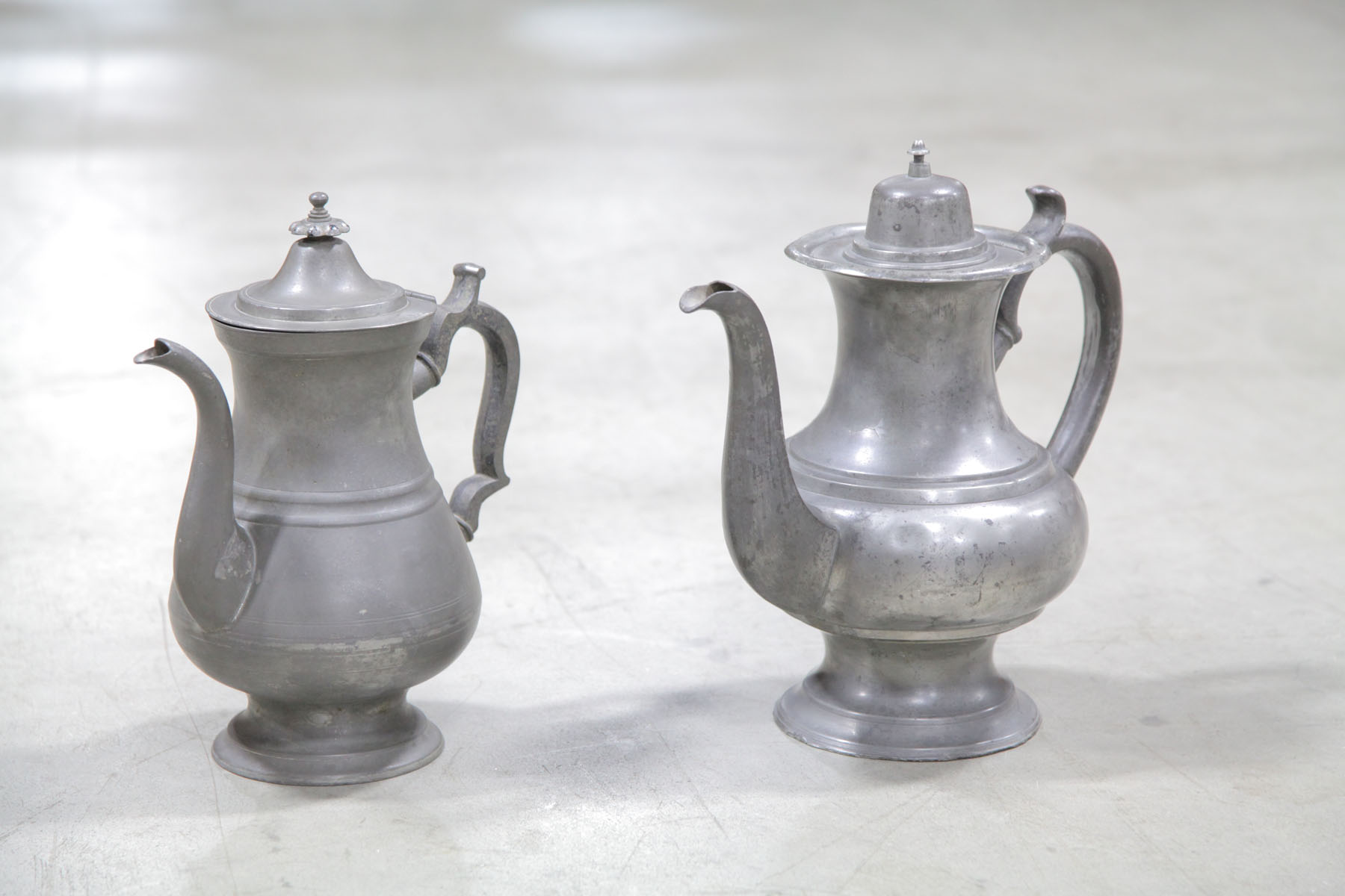 TWO PEWTER COFFEE POTS.  American
