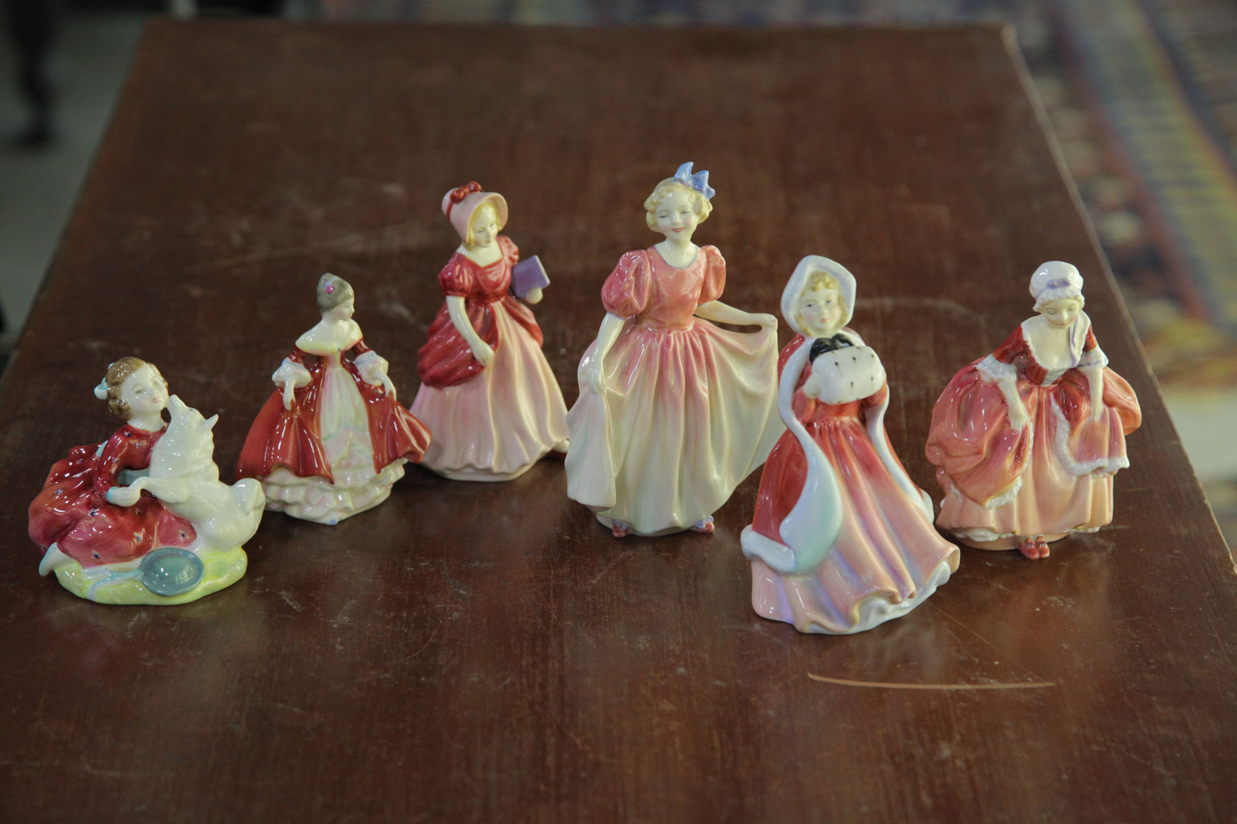 FOUR ROYAL DOULTON FIGURES AND