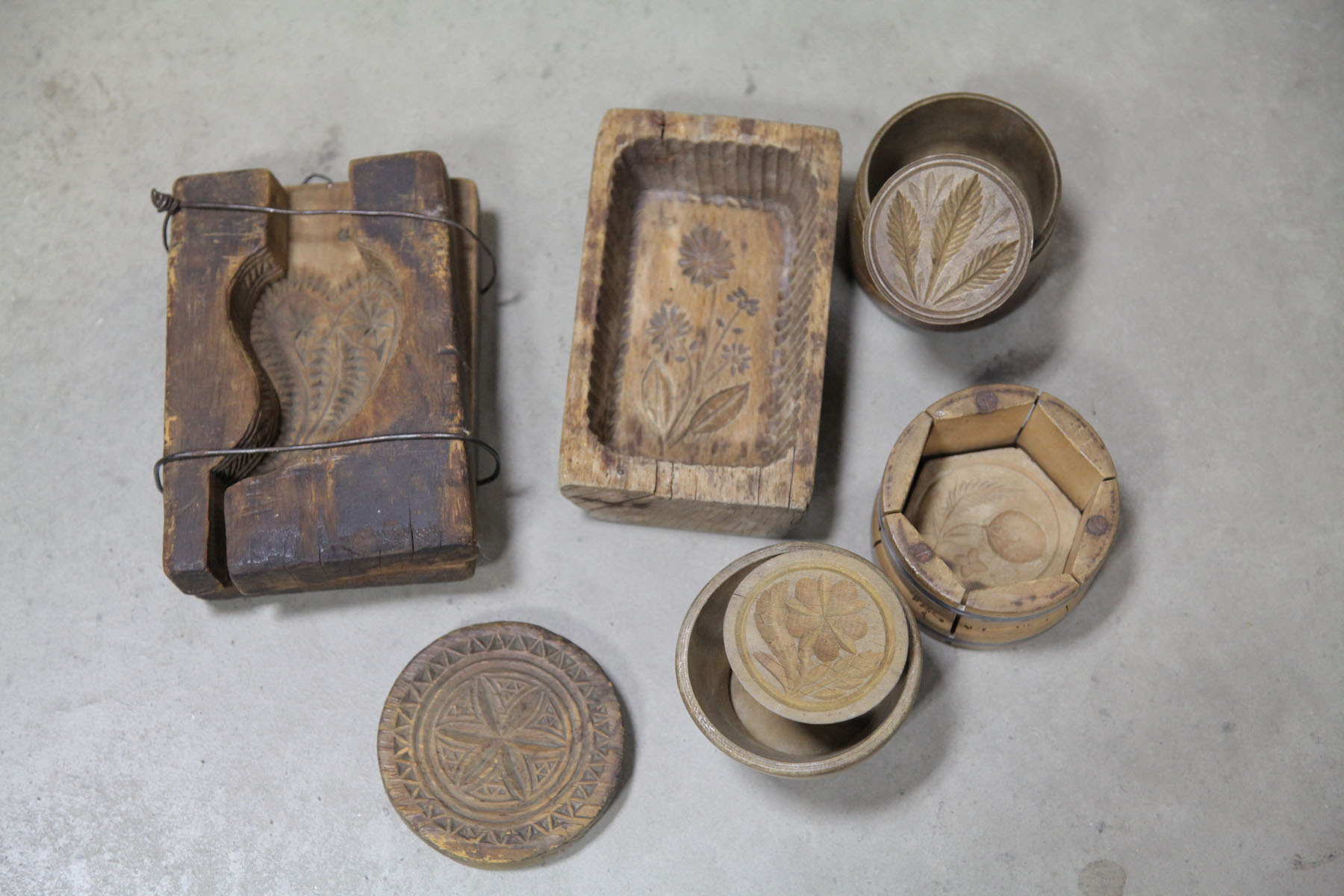 TWO BUTTER MOLDS AND FOUR BUTTER STAMPS.