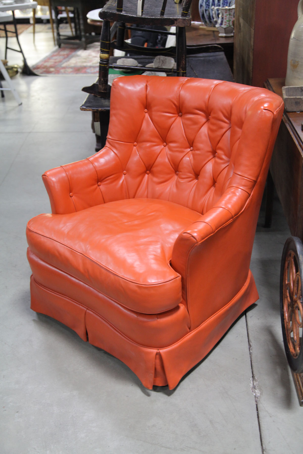 TOMLINSON LEATHER CHAIR.  American