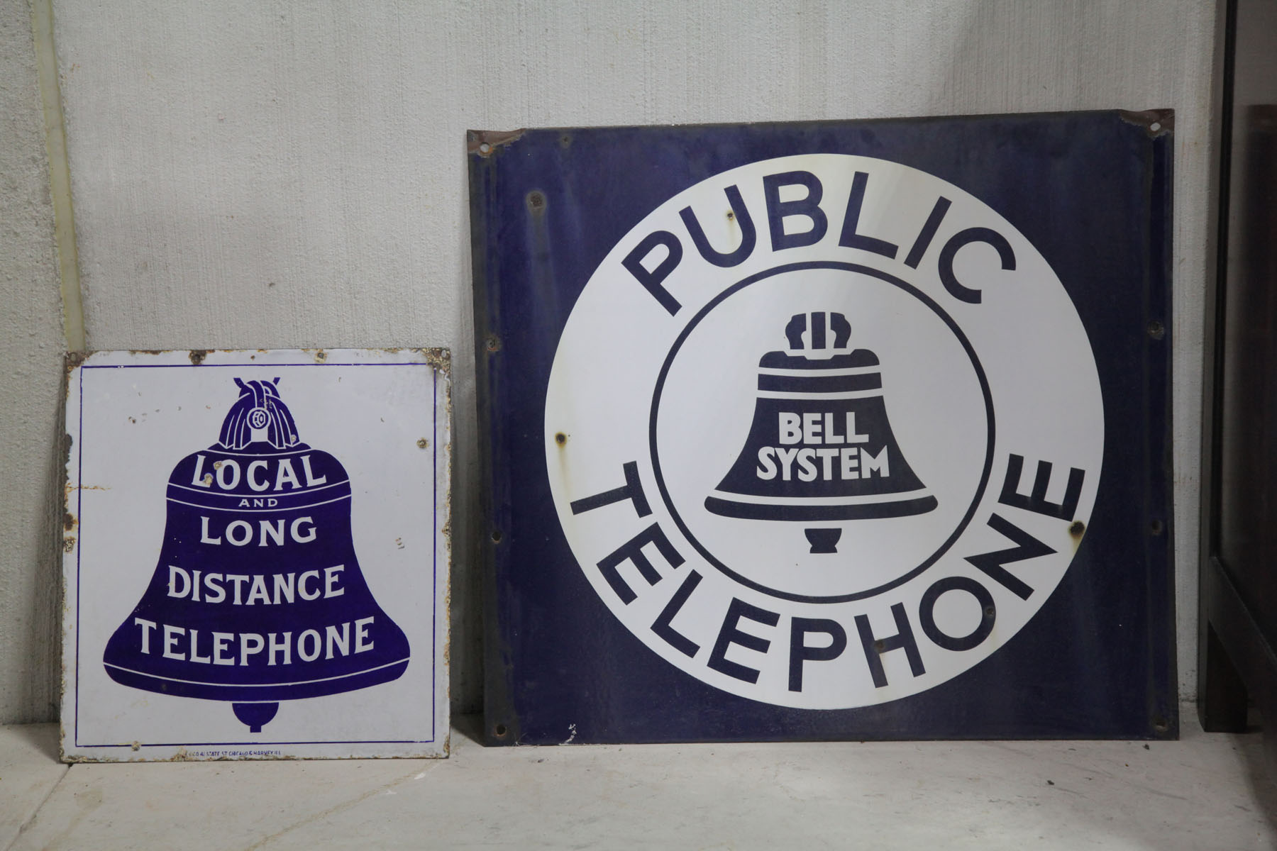 TWO TELEPHONE SIGNS.  American  mid