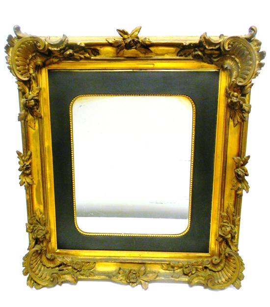 Mirror in elaborate gold frame  twelve