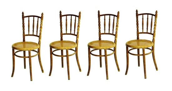 Four Fischel side chairs  cane
