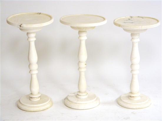 Three white alabaster stands round 10c43e