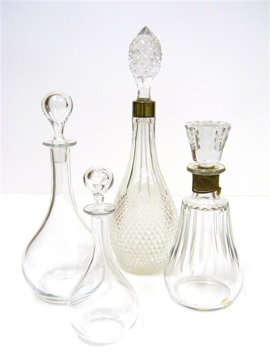 Four colorless glass decanters 10c4fe