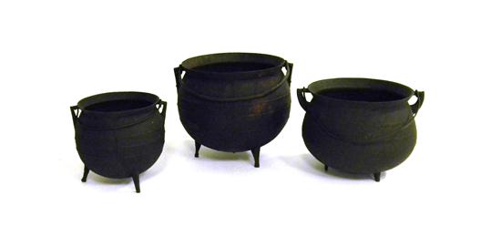 Three iron tripod base cooking pots
