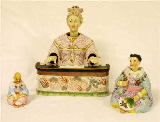 Three bisque porcelain nodder figurines