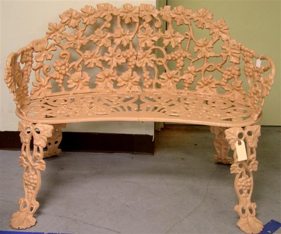 Cast iron garden settee with elaborate