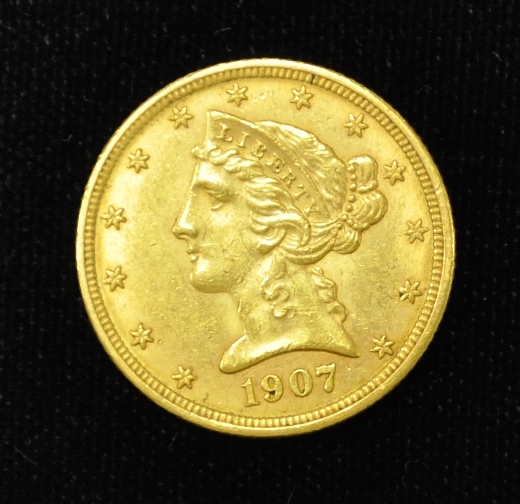 COINS: 1907-D $5 gold coin. XF.