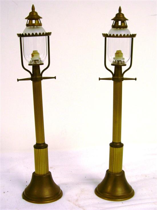 Pair of brass columnar form fluid  10a763