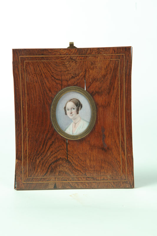 MINIATURE ON IVORY OF A WOMAN.  American