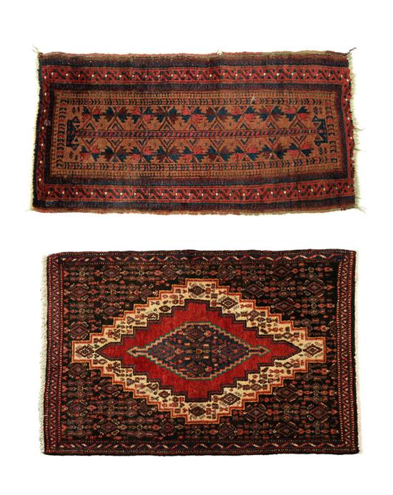 TWO ORIENTAL RUGS.  Belouch. Overall