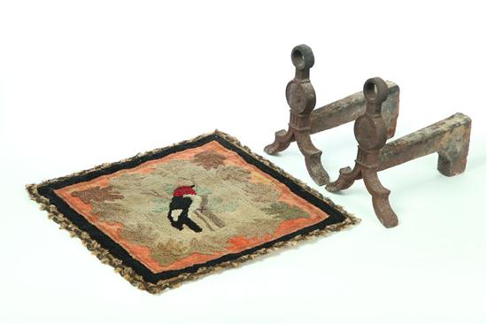 PAIR OF ANDIRONS AND HOOKED MAT.