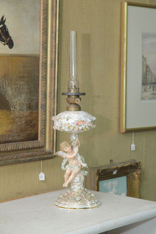 FIGURAL OIL LAMP. Attributed to Meissen.