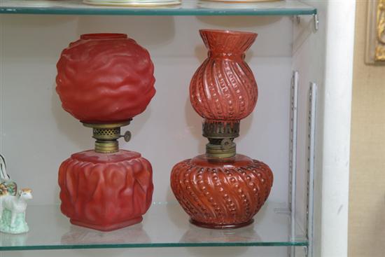 TWO MINIATURE RUBY GLASS OIL LAMPS WITH