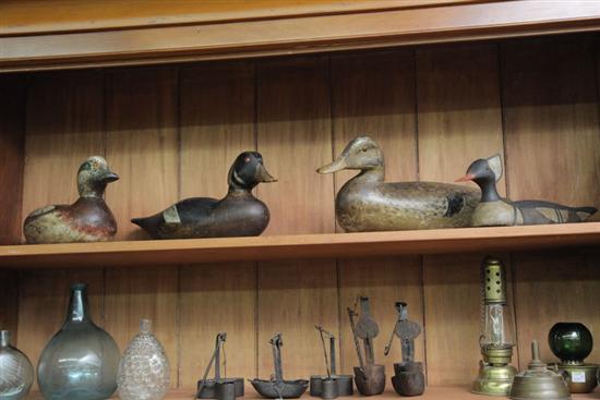 GROUP OF FOUR CARVED AND PAINTED DUCK