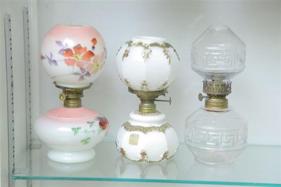 THREE MINIATURE GLASS LAMPS WITH
