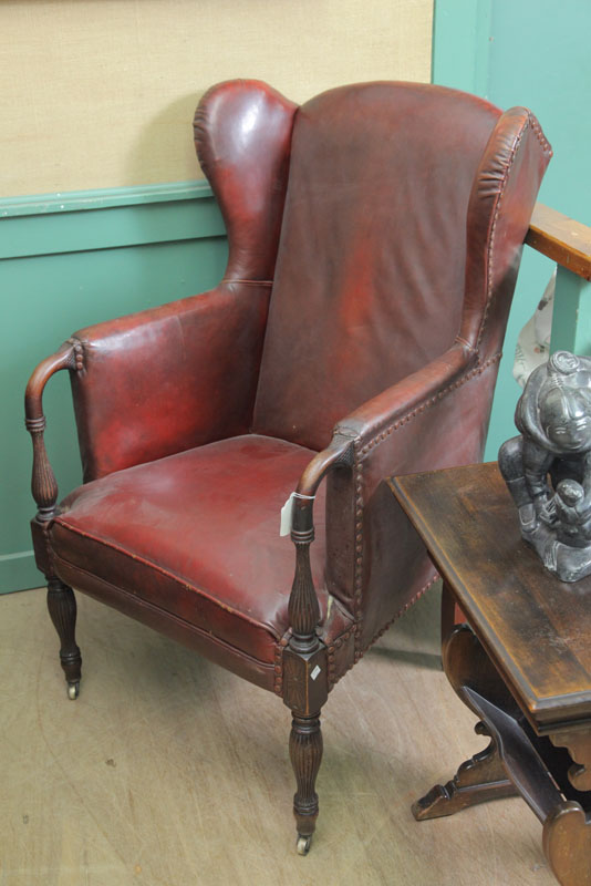 LEATHER ARMCHAIR. Red leather wingchair
