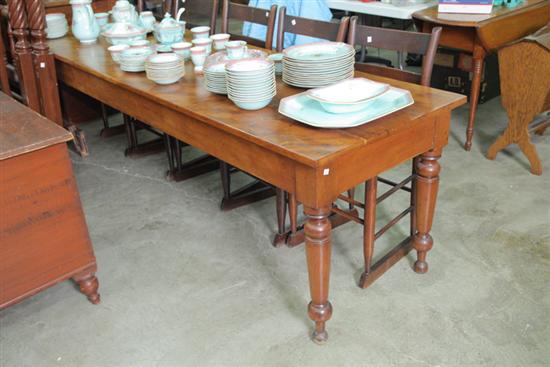 CHERRY LONG TABLE. With turned legs