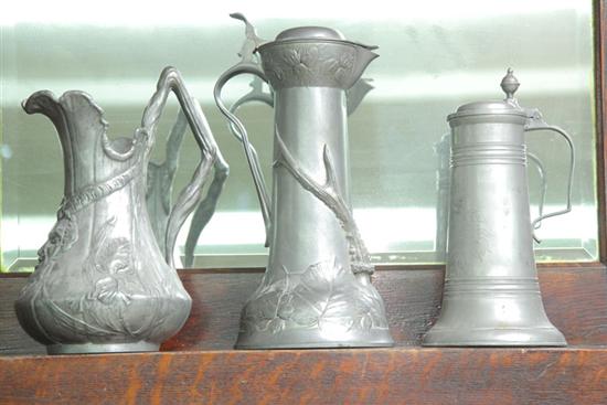 THREE PIECES OF PEWTER A pitcher 10ae2a