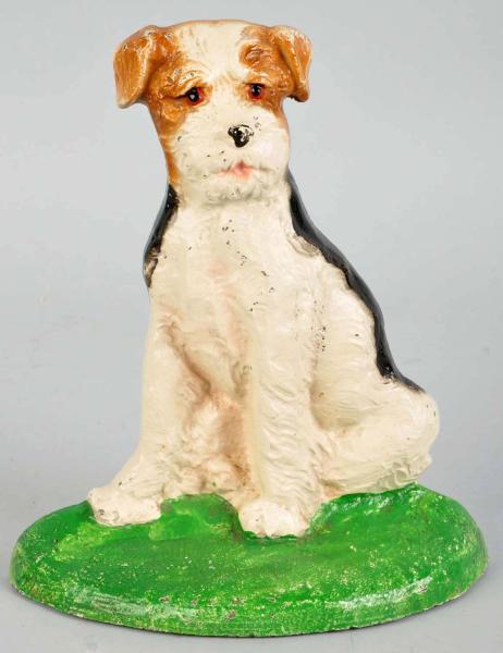 Cast Iron Sitting Fox Terrier Doorstop.