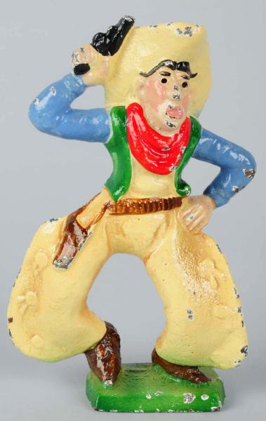 Cast Iron Cowboy with Six Shooter 10dd6b